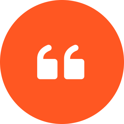 Orange circle with white quotation marks.