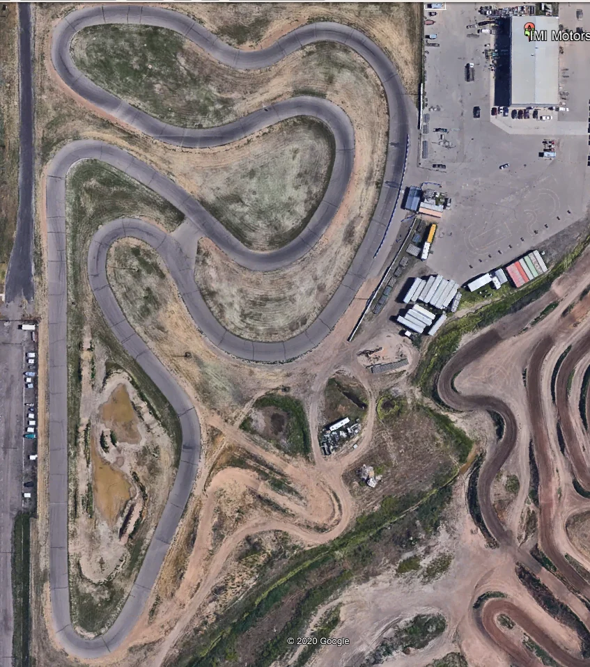 IMI-Motorsports-Park.png A aerial view of a dirt track with lots of ramps.